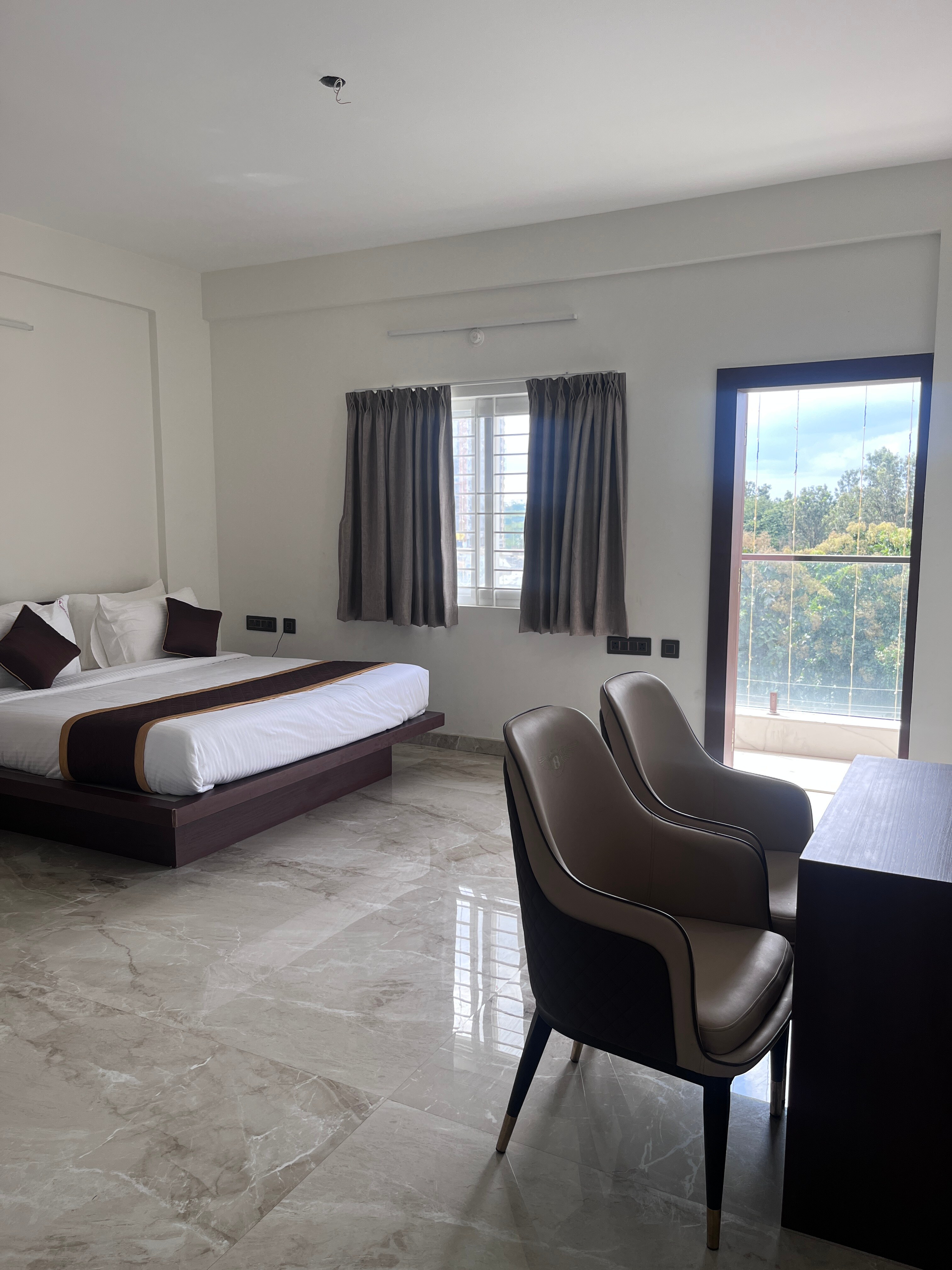 Hotel Sree suites Attibele - Tap to explore photos