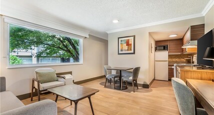 Best Western Plus Burnaby Hotel Room Type - 1 Queen Bed, Non-Smoking, Flat Screen Television, Work Desk, Full Kitchen, In-Room Safe, Sofabed, Fu Best Western Plus Burnaby Hotel Room Type - 1 Queen Bed, Non-Smoking, Flat Screen Television, Work Desk, Full Kitchen, In-Room Safe, Sofabed, Fu