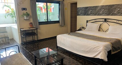 Hotel Sai's Village (101 meters from Saibaba Samadhi Temple) Room Type - Standard Double Bed Non AC