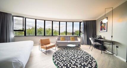 Maek Hotel Antwerp Central - Handwritten Collection Room Type - Junior Suite with 1 King Size bed and sofa, Park View
