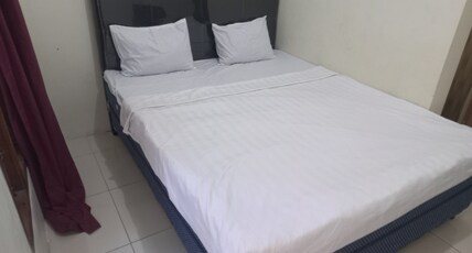 Hotel O Chimi Rumah Kost Room Type - SPOT ON NON AC double