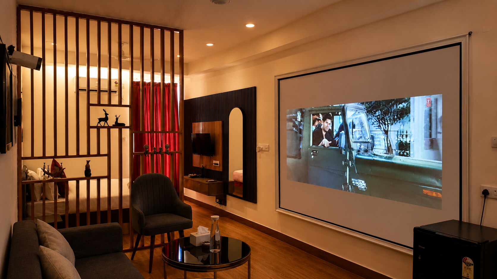Studio apartment Noida Extension with cinema vibe - Tap to explore photos