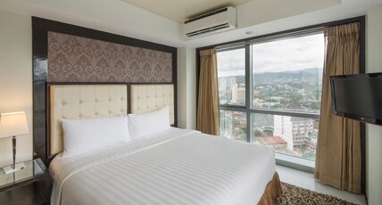 QUEST HOTEL CONFERENCE CENTER Room Type - DELUXE ROOM QUEST HOTEL CONFERENCE CENTER Room Type - DELUXE ROOM