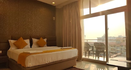 The Bay Suites Sea Facing Hotel-Right On The Golden Beach Room Type - Deluxe Room (Balcony with Side Sea View) The Bay Suites Sea Facing Hotel-Right On The Golden Beach Room Type - Deluxe Room (Balcony with Side Sea View)