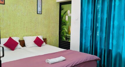 Red Poppy Home Stay Room Type - Deluxe AC Double Room