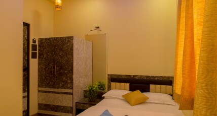 Hotel Tourister Room Type - Deluxe room with Attached bathroom