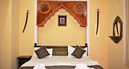 Hotel Sandalwood Inn Room Type - Deluxe Room Non AC Hotel Sandalwood Inn Room Type - Deluxe Room Non AC
