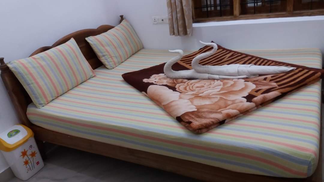 PeriyarGift Homestay Thekkady - Tap to explore photos
