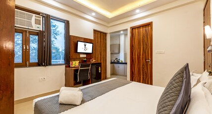 JS RESIDENCY Room Type - Deluxe Room