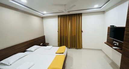 Stay Guru Hari Om Residency Room Type - Executive Deluxe Room