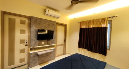 Kumaran Grand Luxury Room Room Type - Deluxe Room