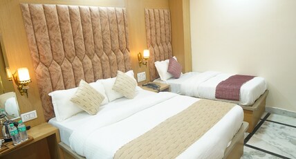 Hotel Mahesh Deluxe Room Type - Deluxe Triple Room