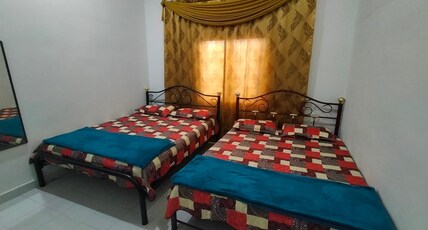 OYO Home 90388 Homestay Masha Room Type - Family Room with Shared Bathroom