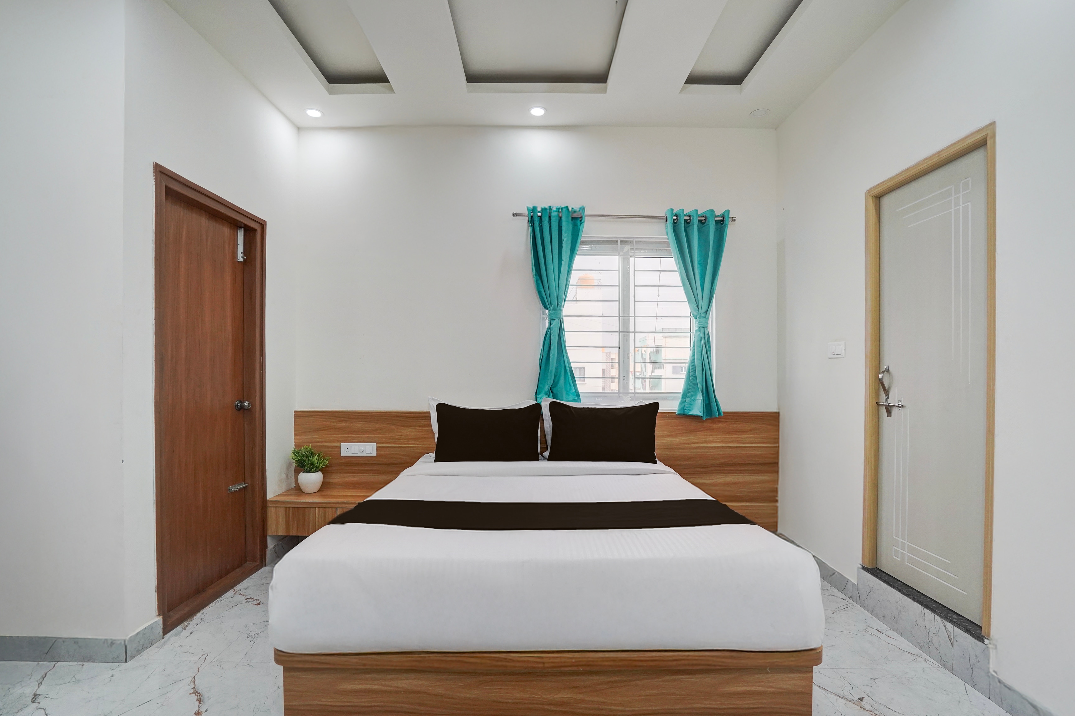 Hotel O V.K Deluxe Rooms - Tap to explore photos