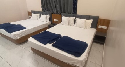 HOTEL PURUSHOTTAM Room Type - 4 Bedded AC Family Room (Price is for 4 Adults) HOTEL PURUSHOTTAM Room Type - 4 Bedded AC Family Room (Price is for 4 Adults)