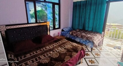 Abhishek Hotel Room Type - Triple Bed
