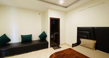 The Aarya Stay @ DIT University Room Type - Deluxe Room A/C