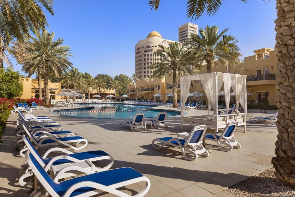 Al Hamra Village Hotel - Tap to explore photos