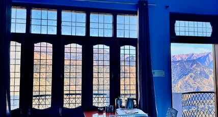 SamathaStay Room Type - Bedroom 3 with shared balcony and Mountain View