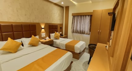 Hotel Riva International-Near Nesco Center Room Type - Deluxe Triple Room Hotel Riva International-Near Nesco Center Room Type - Deluxe Triple Room