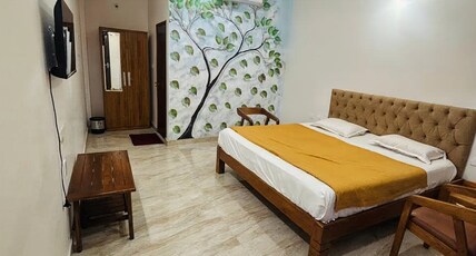 Apple Tower Stay Room Type - King Bed Room with Garden view