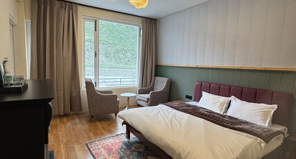 Hobknob - Stay | Cafe | Experience Room Type - Luxury Room with Balcony and River View