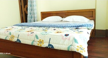 SARTHAKs Homestay Room Type - Bedroom