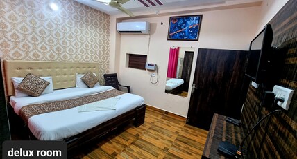 SHREE BHAGWAT DHAM Room Type - Deluxe Room