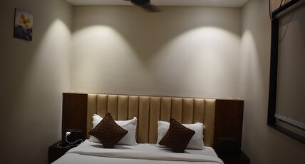 Ambient Rooms. Room Type - Deluxe room