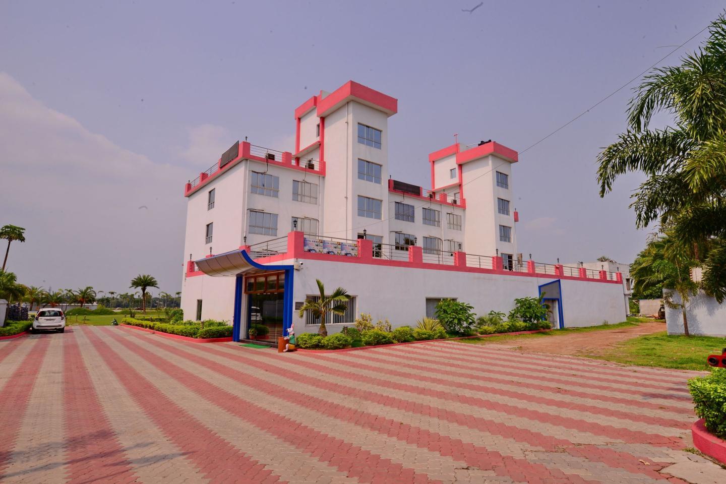 Hotel Girish and Resorts - Tap to explore photos