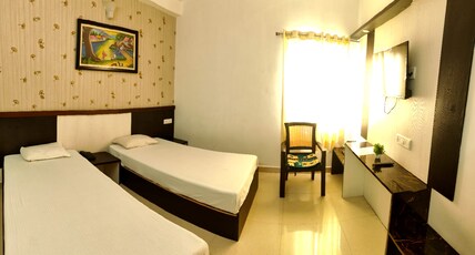 Surya Inn Homestay Room Type - Twin Bedded Room