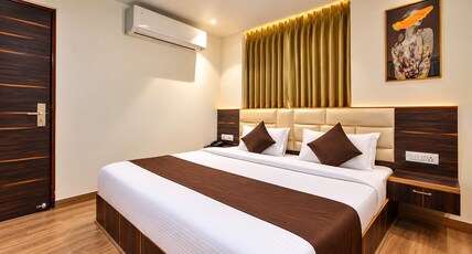 The Crims Hotel Pratap Nagar Room Type - Deluxe Room The Crims Hotel Pratap Nagar Room Type - Deluxe Room