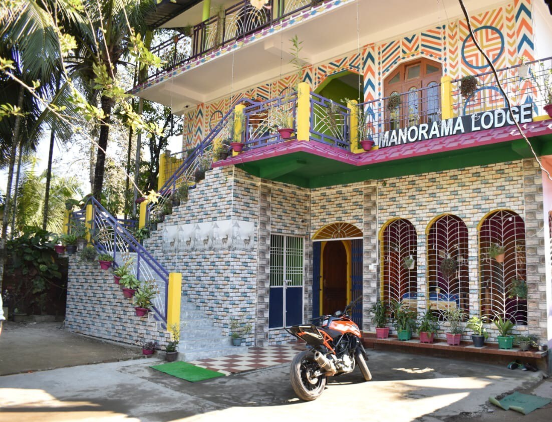 Manorama Lodge - Tap to explore photos
