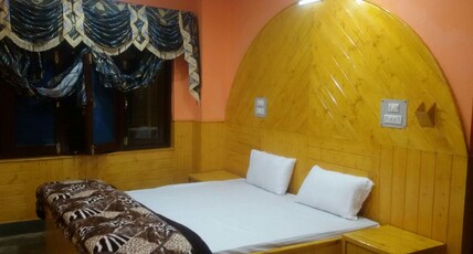 Hotel Grand Inn Room Type - Deluxe Room AC