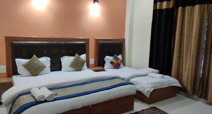 Bhagsu Sarovar Guest House Room Type - Premium Triple Bed