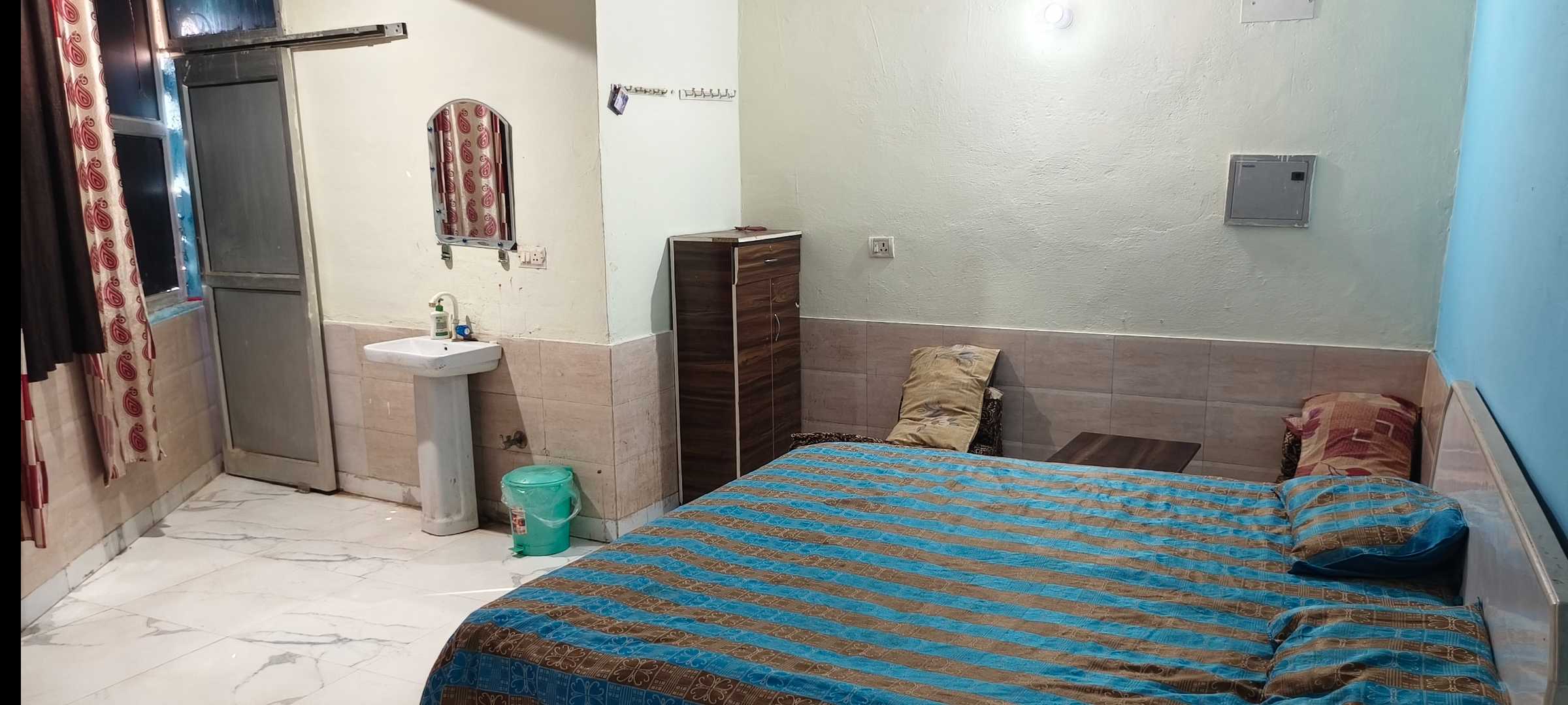 SPOT ON Royal King Guest House - Tap to explore photos