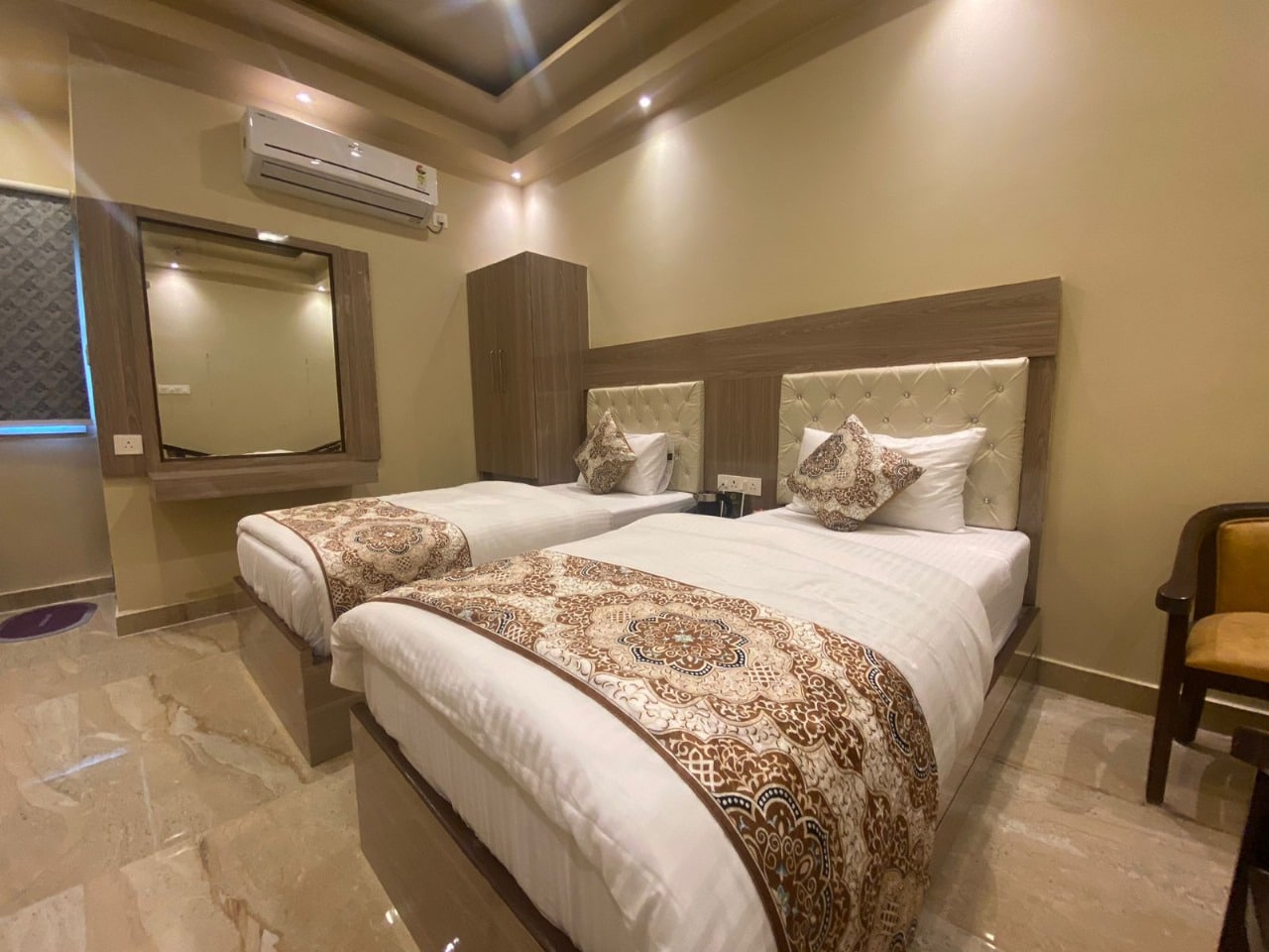 Hotel Varuna Grand - Tap to explore photos