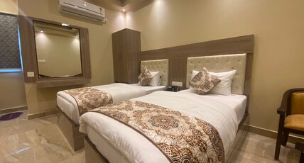Hotel Varuna Grand Room Type - Deluxe Room Twin