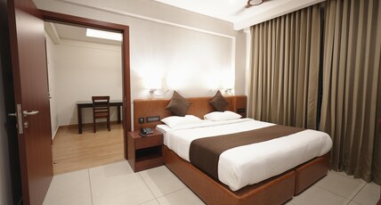 AS Suites | 5 Mins from Kakkanad Infopark Room Type - Superior Room with Living area and Kitchenette