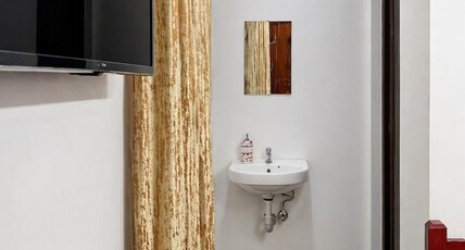 DOWN TOWN HOLIDAYS KOVALAM Room Type - STANDARD ROOM NON AC 