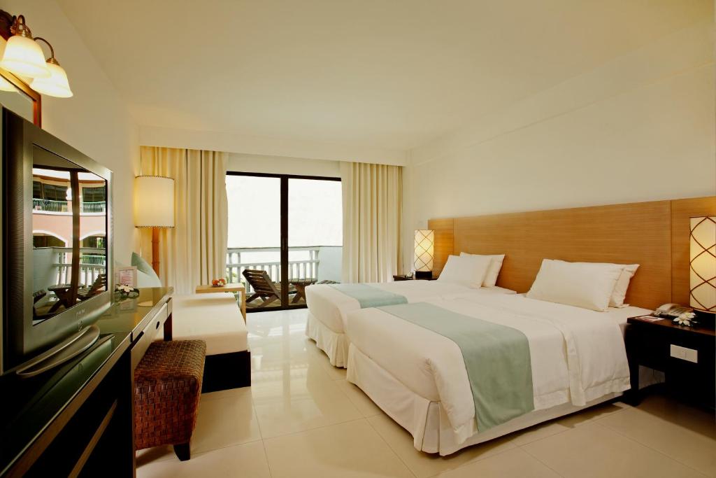 Ramada by Wyndham Phuket Southsea - Tap to explore photos