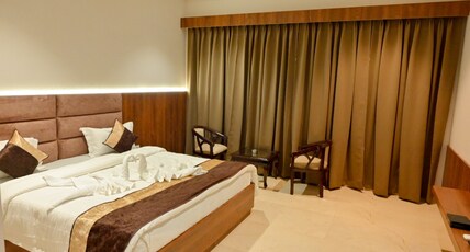 M D Farms & Resorts Room Type - DELUXE ROOM