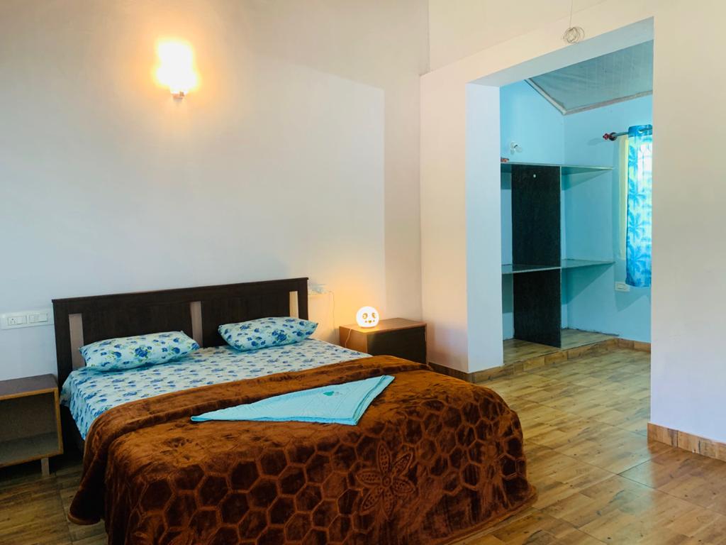Mandara Home Stay | Rooms & Lawn - Tap to explore photos