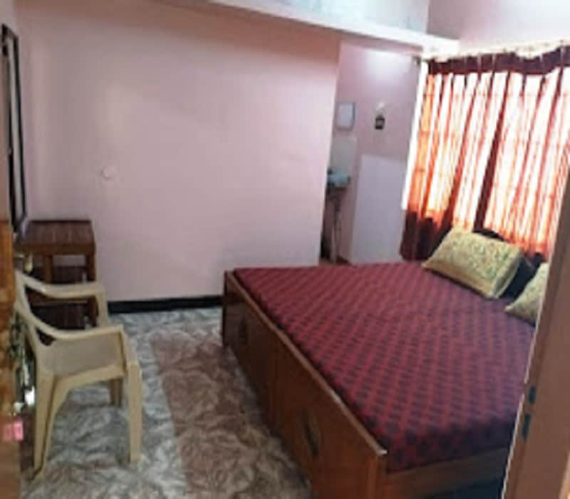 New Anandham kongu A/C Lodge - Tap to explore photos