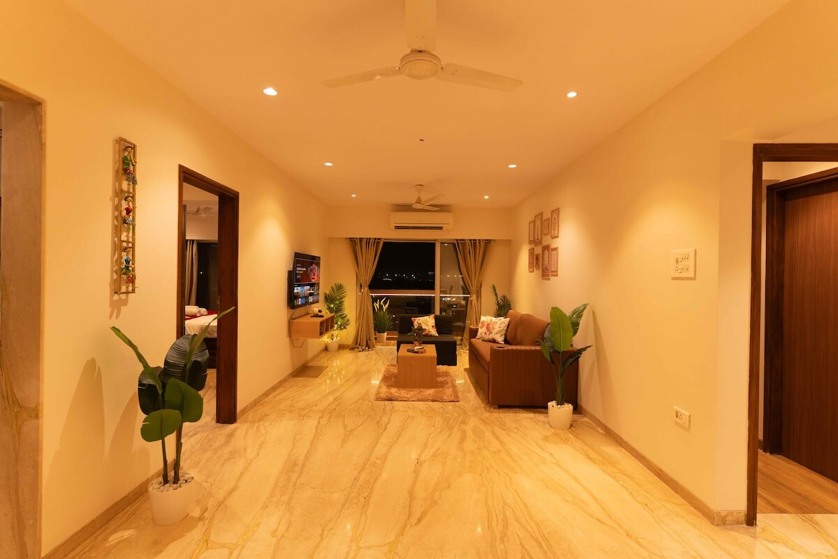 Elite 3BHK with Balcony Runway Views Near BKC by Iconic Stays - Tap to explore photos