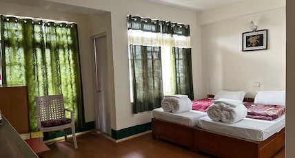 Hotel Garuda Room Type - Deluxe double front view with balcony Hotel Garuda Room Type - Deluxe double front view with balcony