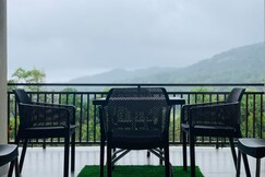 Rooms of Naisarga hill view homestay