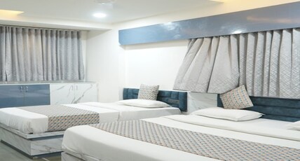 Govardhan Guest House Room Type - Deluxe Three Bed Room