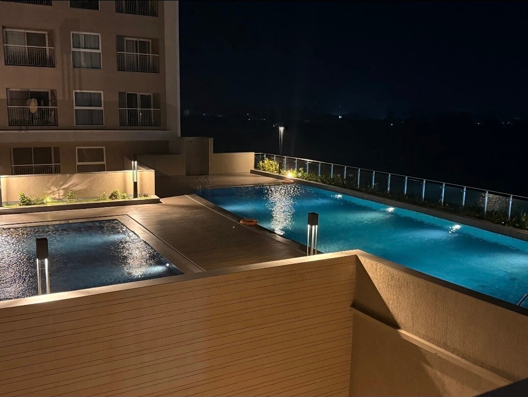 Aashna Paradise Luxurious Hi rise Garden Pool View - Tap to explore photos