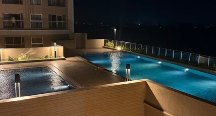 Aashna Paradise Luxurious Hi rise Garden Pool View Room Type - Aashna Paradise Luxurious Hi rise Garden Pool View